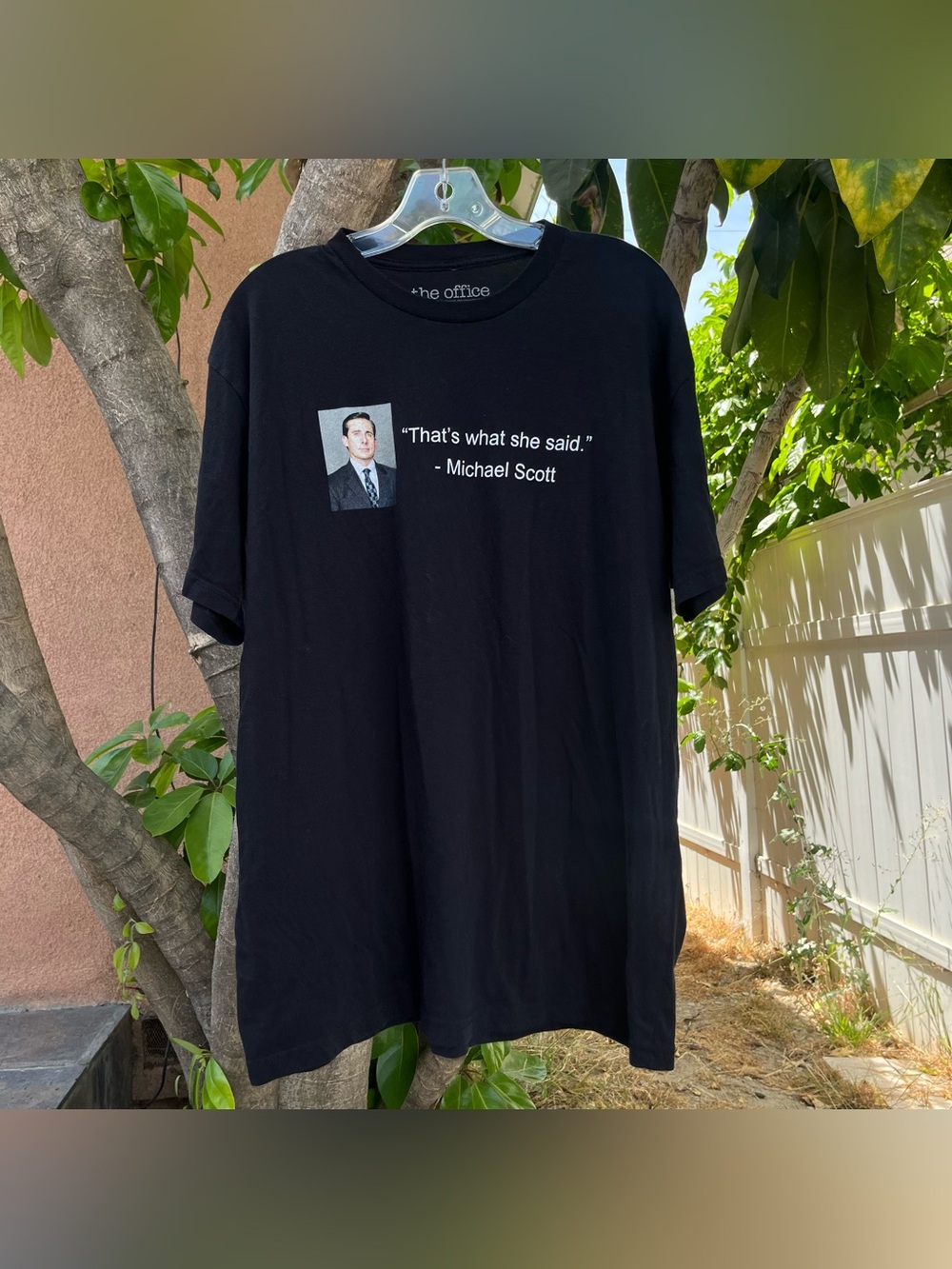 The Office TV Show Black T-Shirt reads, “That’s what she said - Michael Scott ”.